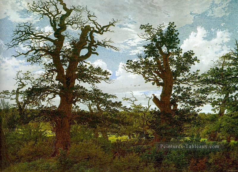 Paysage avec des arbres de chêne et un chasseur romantique Caspar David Friedrich Peintures à l'huile